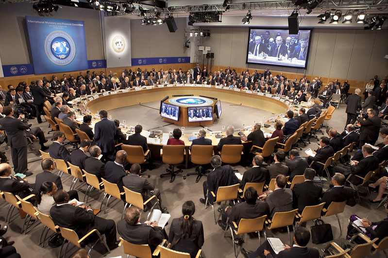 Members of the International Monetary and Financial Committee listen to the Chairman and Egyptian Finance Minister Youssef Bourtos-Ghali as they meet October 9, 2010 at the IMF Headquarters in Washington, DC. 