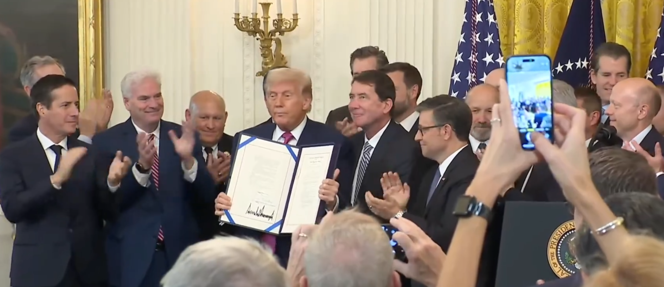 Trump Signs GENIUS Act Into Law, Jokingly Calls It ‘Named After Me’
